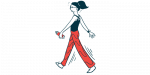 A woman is shown walking vigorously.