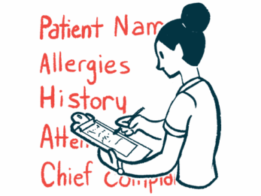 A patient fills in paperwork on medical forms attached to a clipboard.