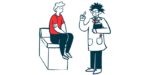 A doctor speaks with a person sitting on an examination table.