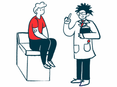 A doctor speaks with a person sitting on an examination table.