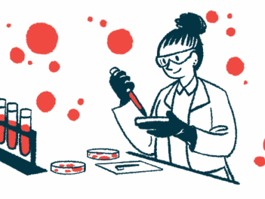 A scientist in a lab uses a petri dish, dropper, and a rack with four filled vials to test blood.
